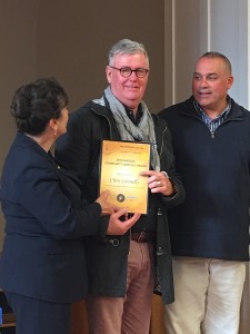 Labor MP Frances Bedford and Aboriginal Leadership Committee chairman John Lochowiak present Chris Connelly (centre) with the Naidoc Award.